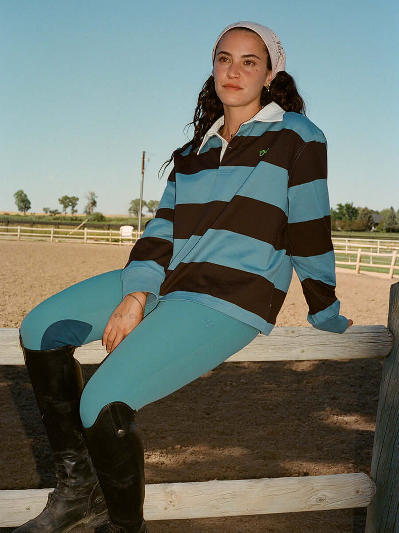 Ride Pant in teal paired with a stylish striped top, perfect for comfortable riding and casual outings.