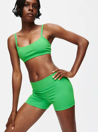 Gemini 3" Short in vibrant green, showcasing the medium-rise fit and signature silicone gripper band.