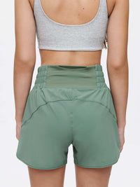 LightSpeed 3" Short in green, showcasing high-waisted design and back view with breathable fabric.