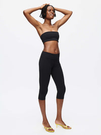 Image of a model showcasing the Love Bra bandeau top, highlighting its stylish look and comfortable fit.