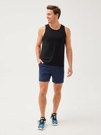 a person wearing a blank tank top