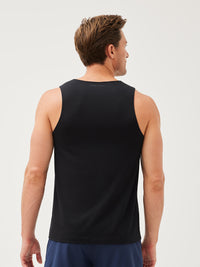 a person wearing a blank tank top