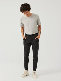 a person wearing black sweatpants