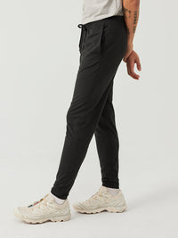 a person wearing black sweatpants