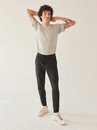 a person wearing black sweatpants
