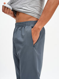 Men's RecTrek Pant in Dark Storm – side close-up of drawstring waist and pocket