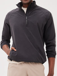 a person wearing a black jacket