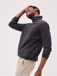 a person wearing a black jacket