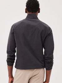 a person wearing a black jacket