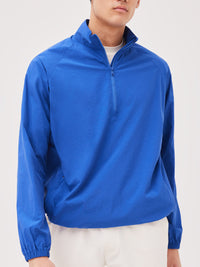 a person wearing a blue jacket