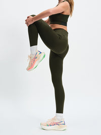 TechSweat Core 7/8 Legging in Forest – side view with knee raised in a stretch