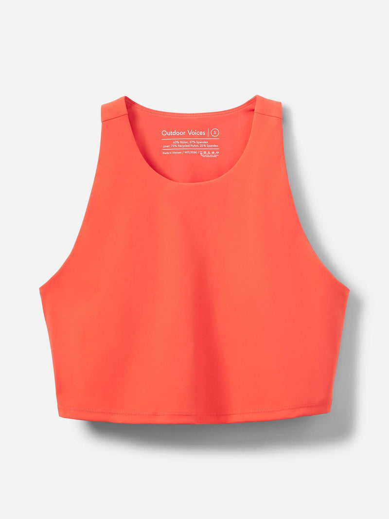 SuperForm Crop Top in vibrant orange color with a high-coverage neckline and built-in shelf bra.