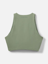 Back view of the SuperForm Crop Top in green, featuring a sleek design and built-in shelf bra for light support.