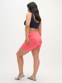 Model from back wearing Double Dip Bra in Cotton Candy, with wide shoulder straps and soft elastic fit.