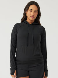a person wearing a black sweater