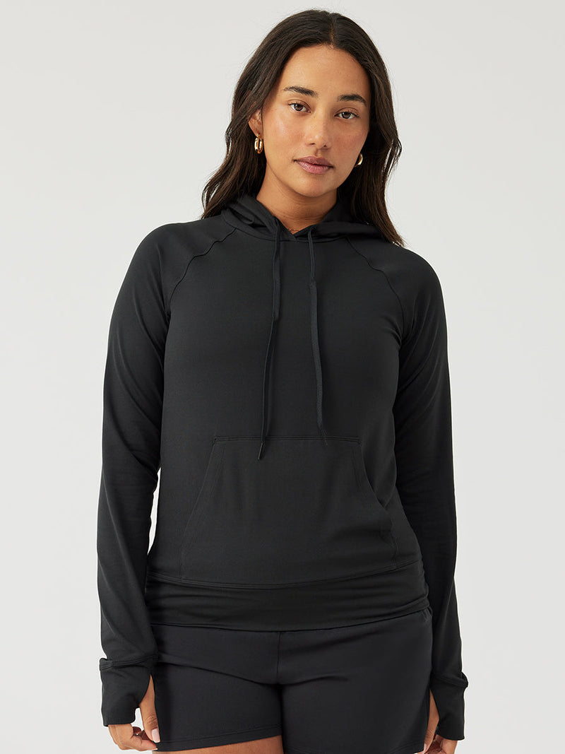 a person wearing a black sweater