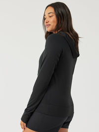 a person wearing a black sweater