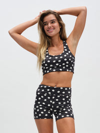 TechSweat 3.5" Short in Polka Dot – front view with arms raised, styled with matching Doing Things Bra