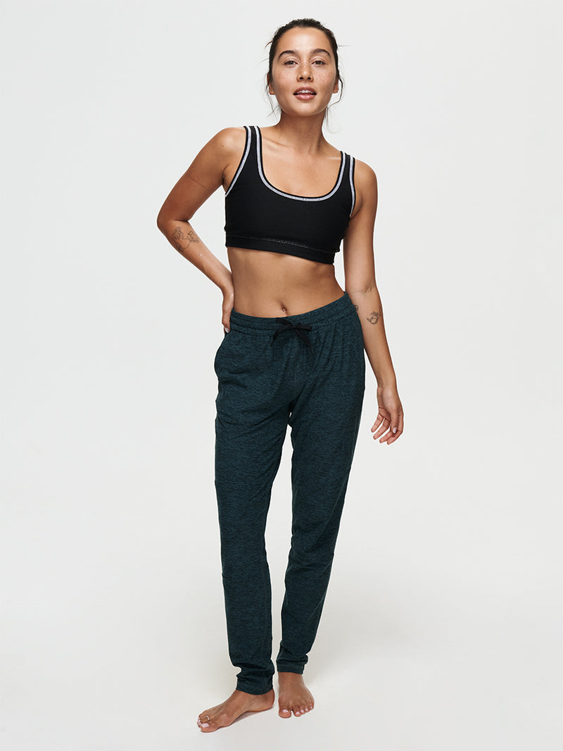 A model wearing CloudKnit Sweatpant with side pockets and a drawstring waistband, demonstrating comfort and style.