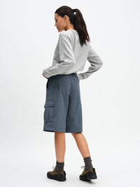 RecTrek Cargo Short in Dark Storm – back three-quarter full-length view