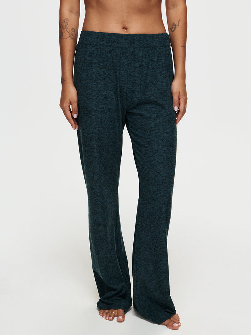 Model wearing CloudKnit Wide Leg Pant made of soft, breathable fabric for maximum comfort.