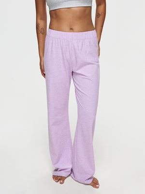 Model wearing CloudKnit Wide Leg Pant in lavender, showcasing the soft, breathable fabric and relaxed fit.