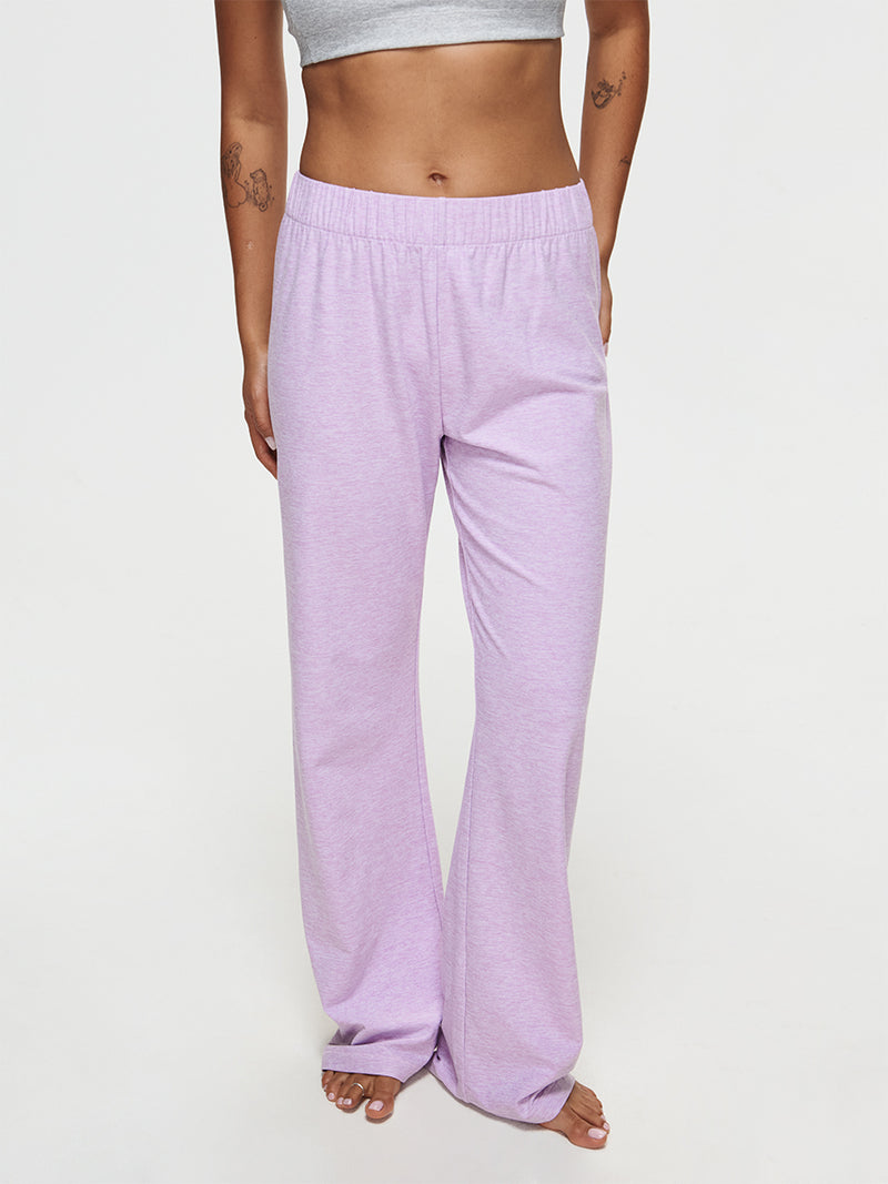 Model wearing CloudKnit Wide Leg Pant in lavender, showcasing the soft, breathable fabric and relaxed fit.