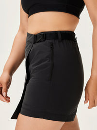 a person wearing a black skirt
