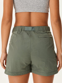 a person wearing a green skirt