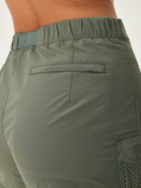 a person wearing a green skirt