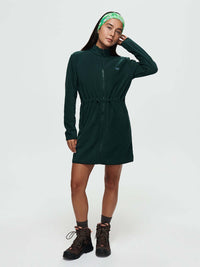 Model wearing Boulder Dress in Forest Green with adjustable waist toggles and full zip for a comfortable fit.