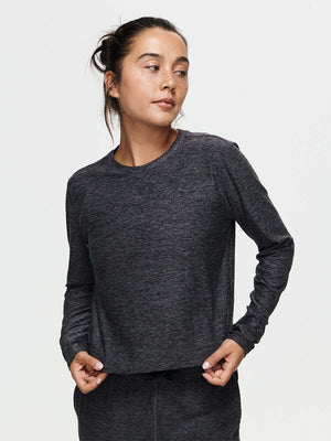 Model wearing CloudKnit Boxy Longsleeve in Charcoal, cropped length with lightweight, breathable fabric.