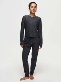 Model wearing CloudKnit Boxy Longsleeve in Dark Gray, cropped length with relaxed fit, styled for lounging.