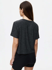 Back view of CloudKnit Boxy Shortsleeve in Charcoal, cropped fit that emphasizes comfort and breathability.
