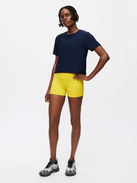 Model posing in CloudKnit Boxy Shortsleeve in Navy, featuring a relaxed fit and cropped length.