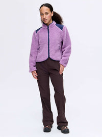 Model wearing Candy Fleece Jacket in Lavender with contrast technical nylon panels, designed for everyday comfort.