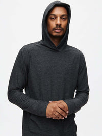 Model wearing CloudKnit Hoodie in Charcoal, soft and lightweight fabric with hood for everyday wear.