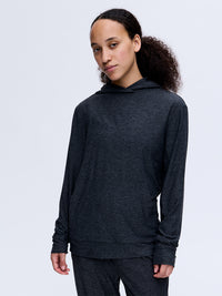 Model wearing CloudKnit Hoodie in Dark Heather, with a soft, lightweight fabric.
