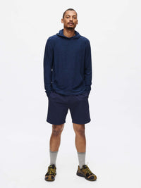 Model wearing CloudKnit Hoodie in Navy, featuring a large kangaroo pocket for everyday comfort.