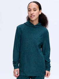 Model wearing CloudKnit Hoodie in Teal, featuring a soft, lightweight design and relaxed fit for everyday wear.