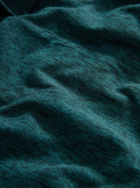 Close-up of CloudKnit fabric in Deep Teal, highlighting its soft texture and lightweight properties.