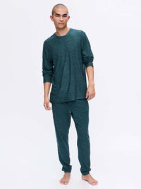 Model wearing CloudKnit Longsleeve in Dark Teal with relaxed fit, styled for lounging.
