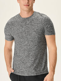 Model wearing CloudKnit Shortsleeve in Heather Grey, showing soft, lightweight fabric for everyday comfort.