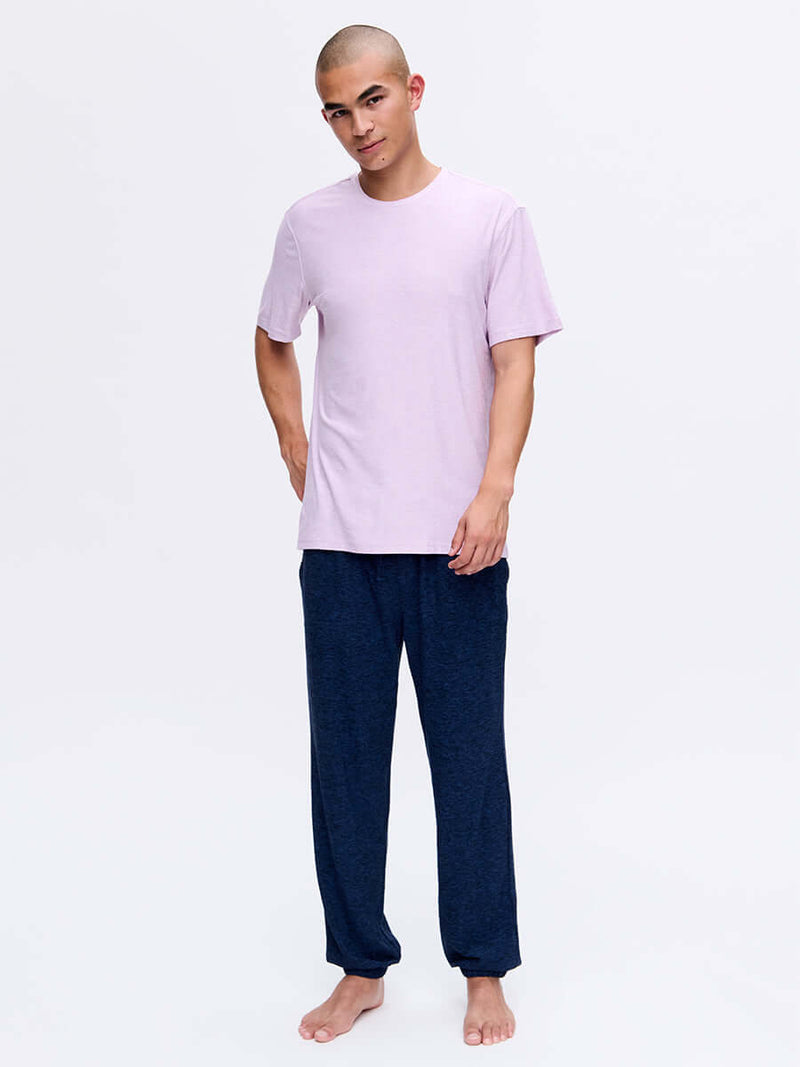 Model standing in CloudKnit Shortsleeve in Light Purple, soft and lightweight fabric for everyday wear.