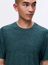 Model wearing CloudKnit Shortsleeve in deep teal, soft and lightweight fabric ideal for everyday wear.