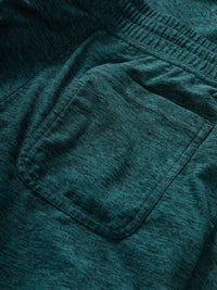 Close-up of CloudKnit Slim Sweatpant in teal, featuring the back pocket detail.
