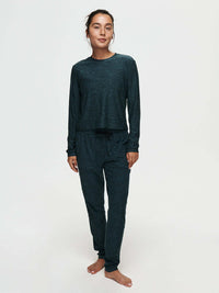 Model standing in casual pose wearing CloudKnit Boxy Longsleeve in Dark Gray, cropped length for comfy lounging.