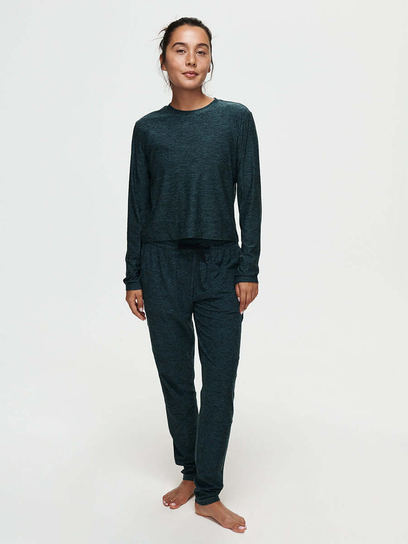 Model standing in casual pose wearing CloudKnit Boxy Longsleeve in Dark Gray, cropped length for comfy lounging.