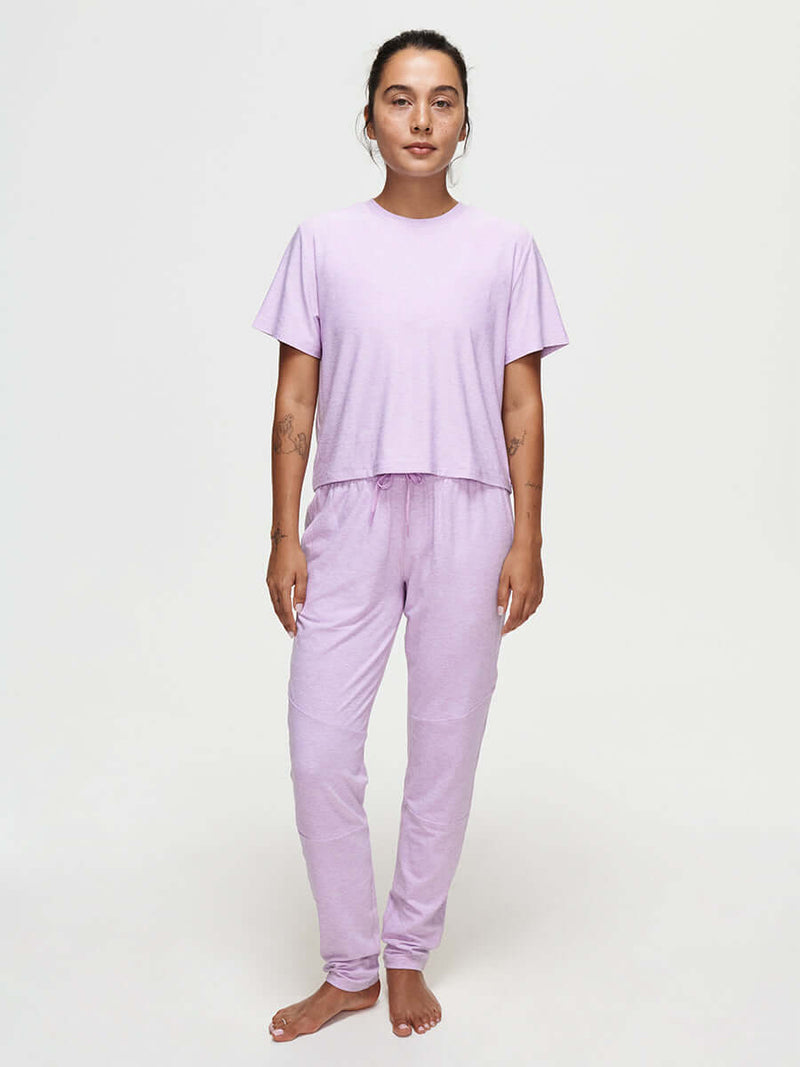 Model wearing CloudKnit Sweatpant with matching top in lavender, with comfort and style.