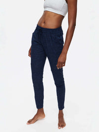 Model standing in CloudKnit Sweatpant in Navy with a custom-fit drawstring waistband and side pockets.